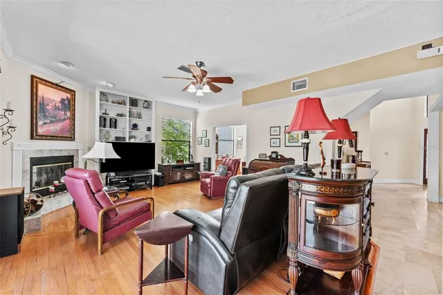 a bathroom with a sink mirror and toilet
