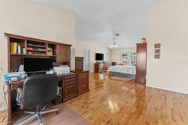 a room with gym equipment and a large window