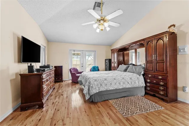 a view of a balcony with wooden floor
