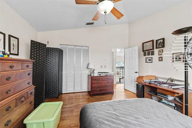 a view of a backyard with a patio and a garden