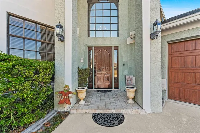 a view of entryway and hall with dining room
