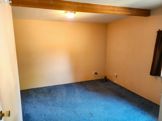 a view of small space with a door