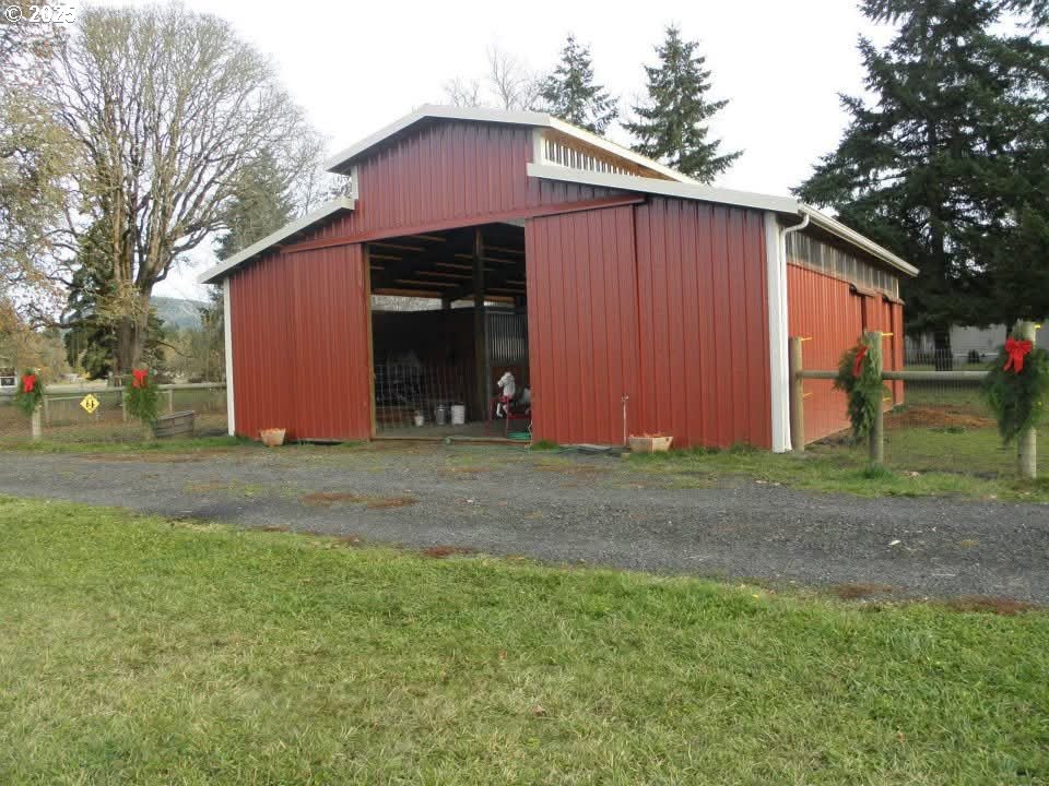38717 Dexter Road Dexter, OR 97431 - Photo 13 of 38 a front view of house with backyard and trees