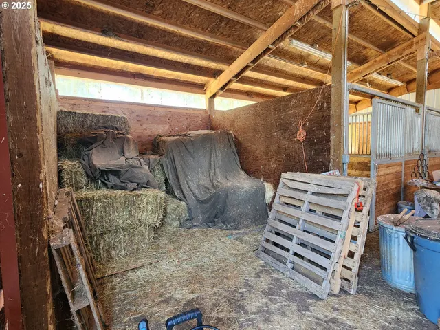 a view of an house with pool and ocean view
