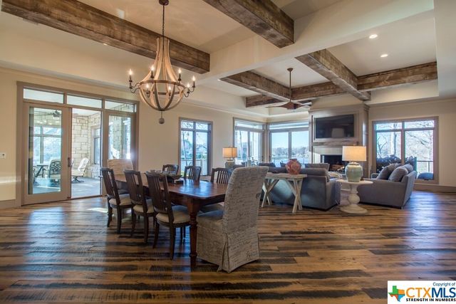 a kitchen with a refrigerator stove and cabinets