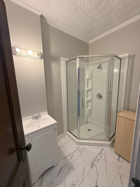 356 Springfield Street, Unit 1 Chicopee, MA 01013 - Photo 5 of 10 a bathroom with a shower and a sink