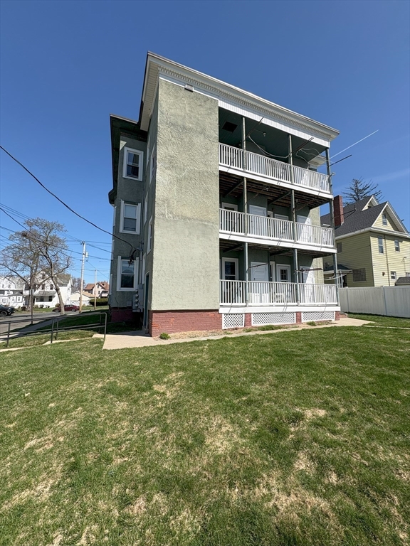 356 Springfield Street, Unit 1 Chicopee, MA 01013 - Photo 9 of 10 a house view with swimming pool in front of it