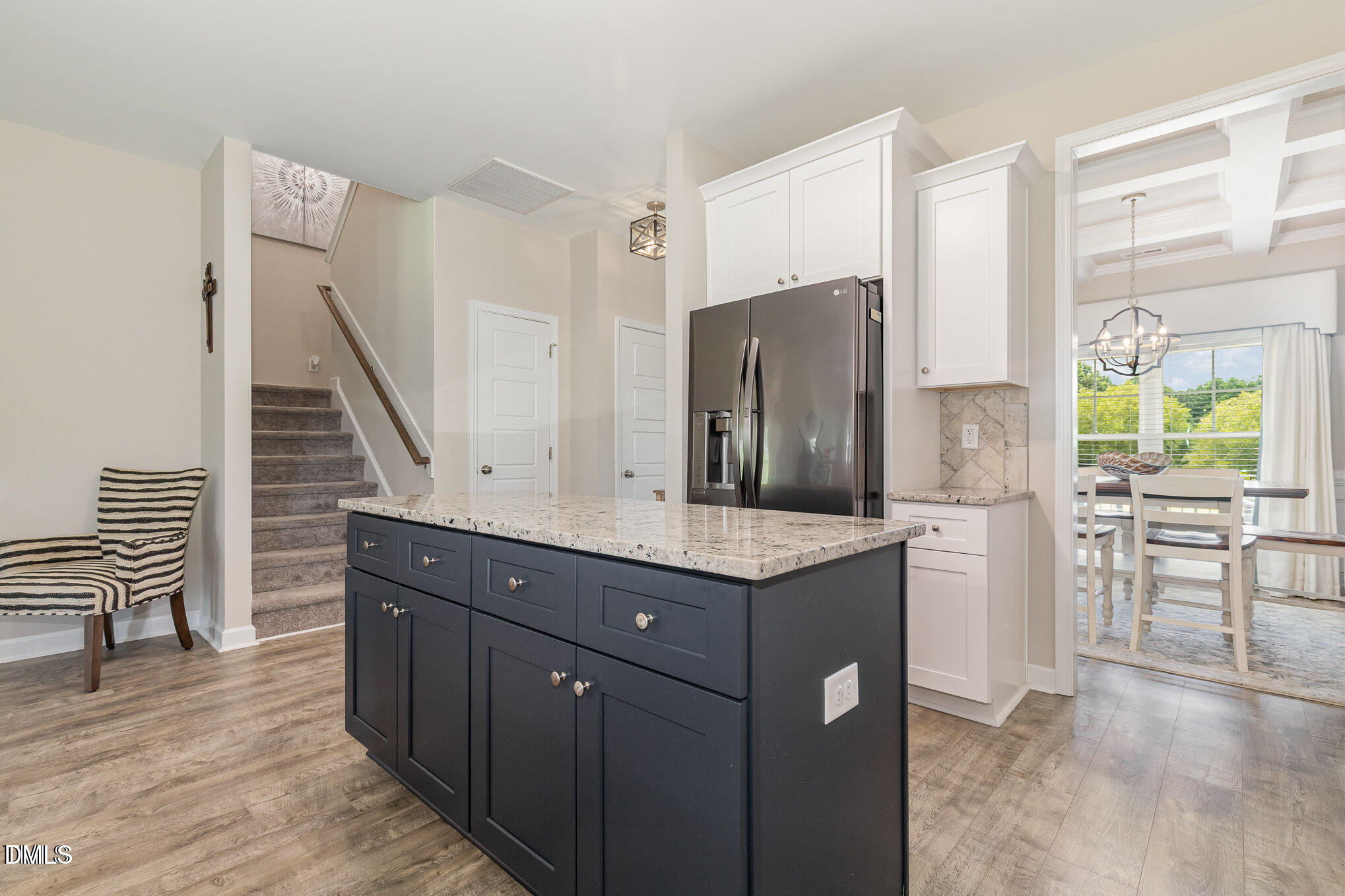 8662 Buckhorn Plantation Road Sims, NC 27880 - Photo 9 of 37 a kitchen with stainless steel appliances granite countertop a refrigerator and a stove top oven