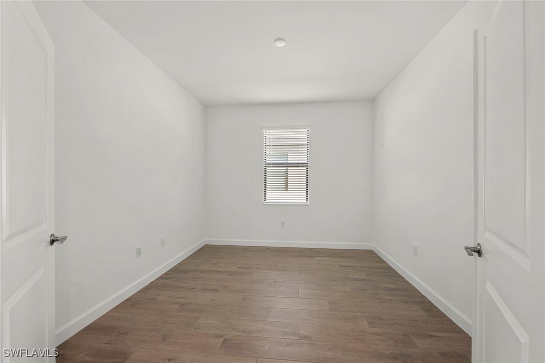 20446 Napa Loop Estero, FL 33928 - Photo 12 of 42 wooden floor in an empty room