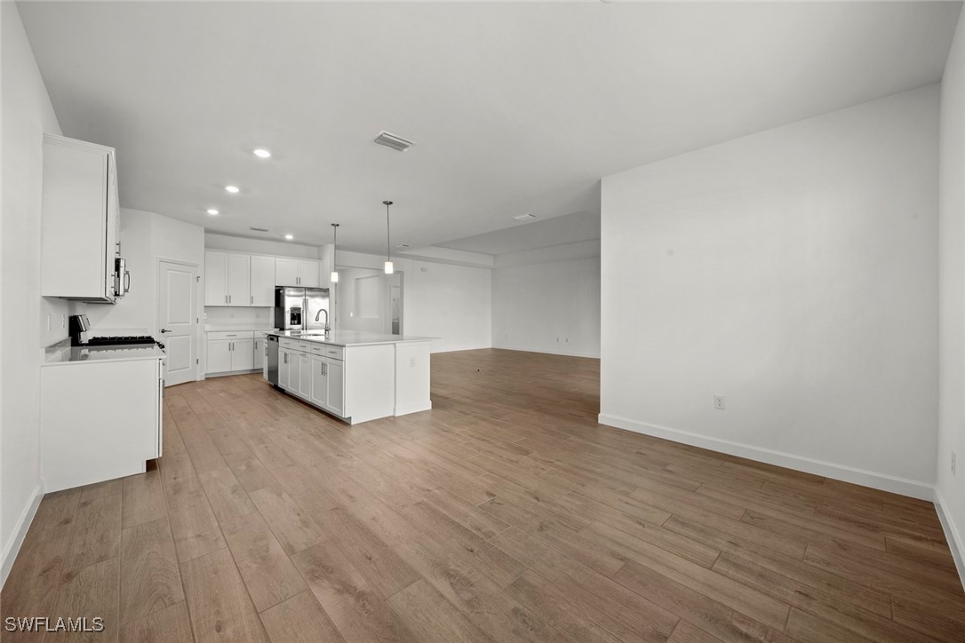 20446 Napa Loop Estero, FL 33928 - Photo 20 of 42 a view of kitchen with wooden floor