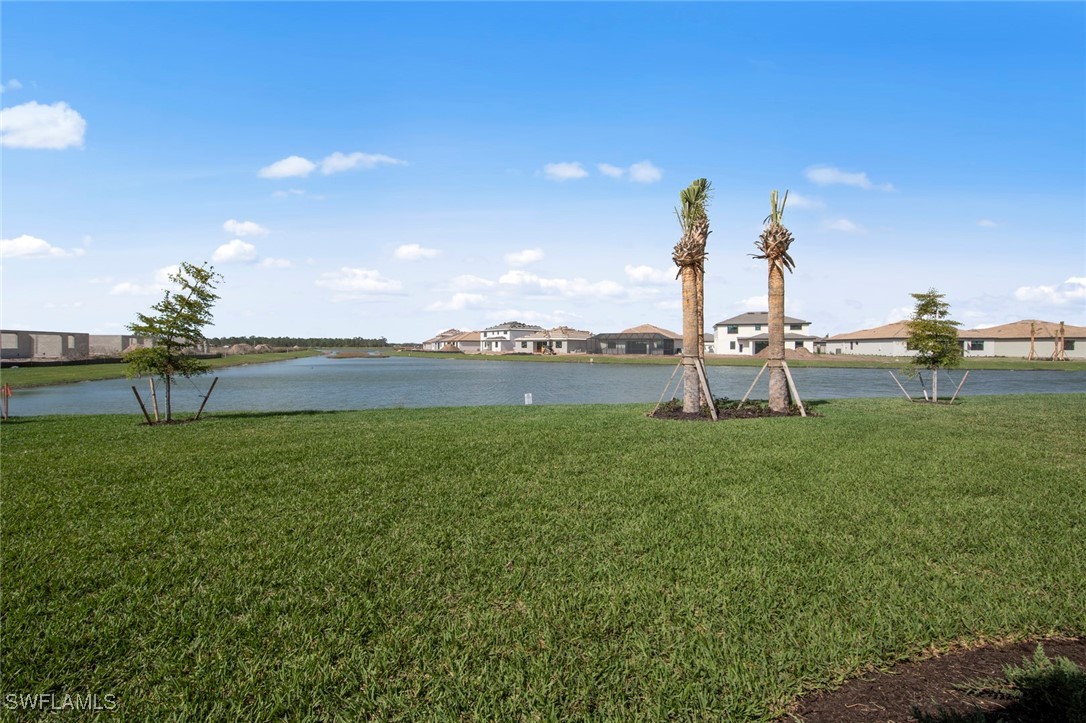 20446 Napa Loop Estero, FL 33928 - Photo 36 of 42 a view of a lake and with houses