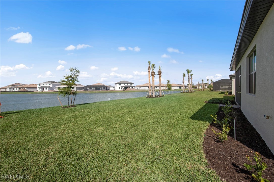 20446 Napa Loop Estero, FL 33928 - Photo 38 of 42 a view of a green field