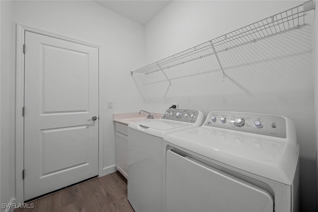 20446 Napa Loop Estero, FL 33928 - Photo 42 of 42 a utility room with dryer and washer