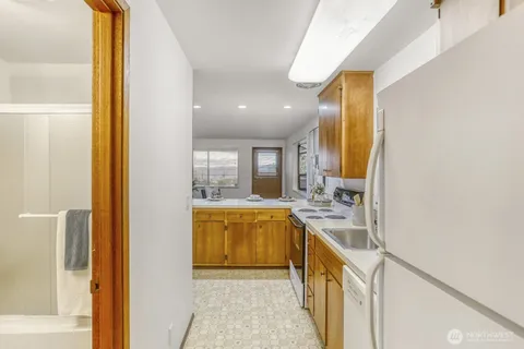 $1,800,000 | 9922 Triton Drive Northwest, Unit A&B, Seattle, WA 98117