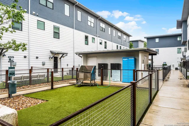 a view of a house with sitting area and furniture