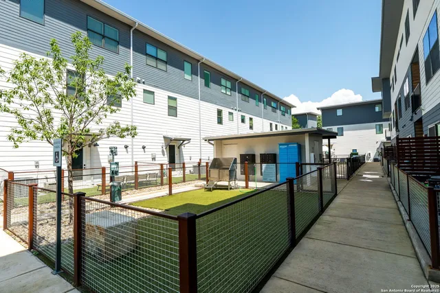 a view of a street with houses