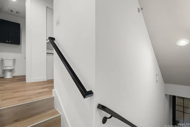 a view of entryway with wooden floor