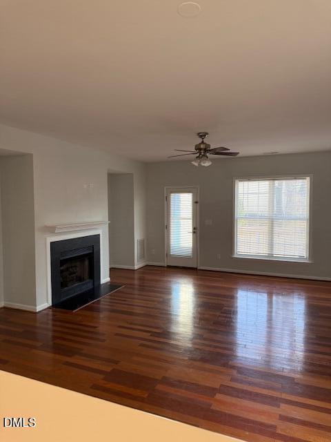 2036 Turtle Point Drive Raleigh, NC 27604 - Photo 12 of 27 a view of a livingroom with wooden floor fireplace and window