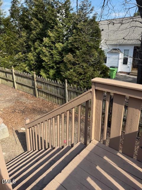 2036 Turtle Point Drive Raleigh, NC 27604 - Photo 14 of 27 a view of a balcony with wooden floor and fence