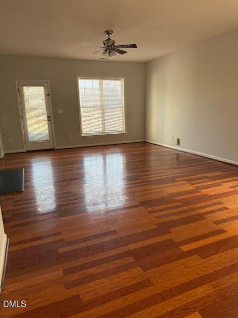 2036 Turtle Point Drive Raleigh, NC 27604 - Photo 9 of 27 an empty room with wooden floor and windows