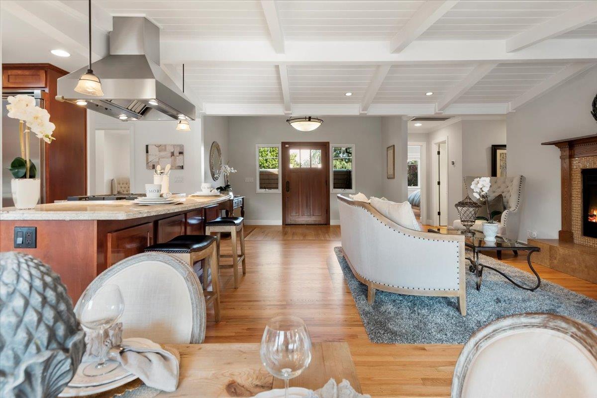 466 Springer Road Los Altos, CA 94024 - Photo 11 of 52 a living room with fireplace furniture and a view of kitchen