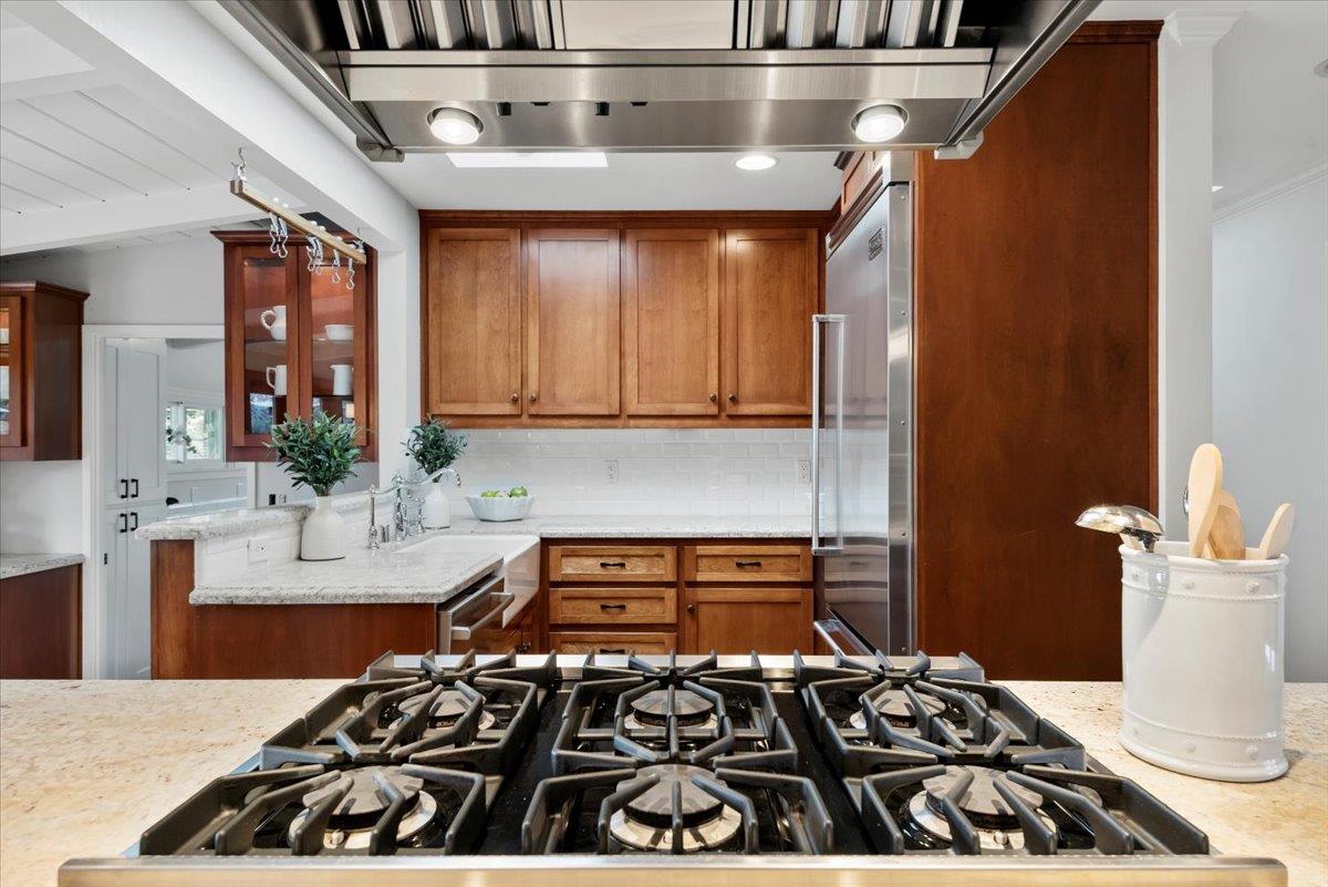 466 Springer Road Los Altos, CA 94024 - Photo 14 of 52 a kitchen with a stove and a sink