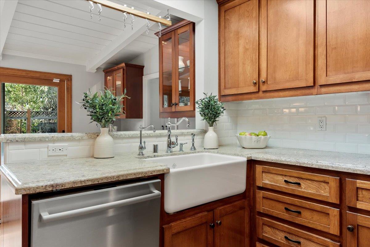 466 Springer Road Los Altos, CA 94024 - Photo 15 of 52 a kitchen with a sink and cabinets