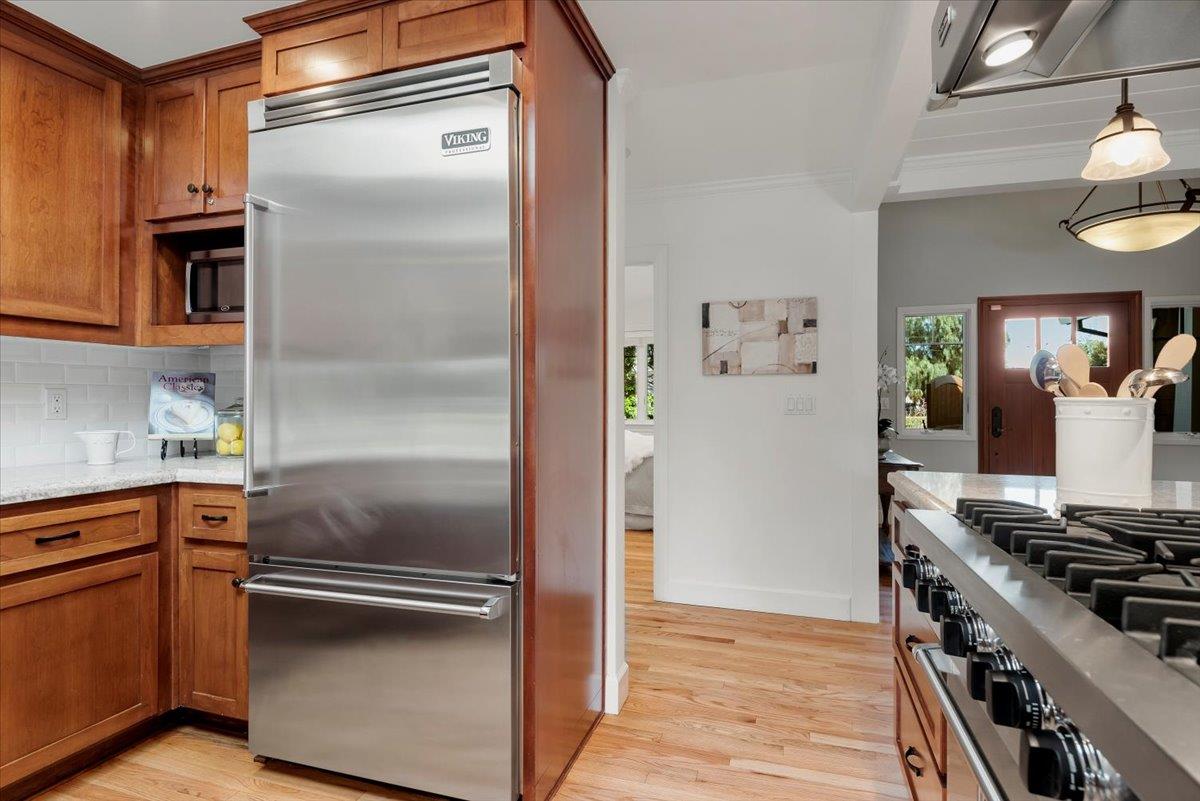 466 Springer Road Los Altos, CA 94024 - Photo 16 of 52 a kitchen with stainless steel appliances granite countertop a refrigerator and a stove