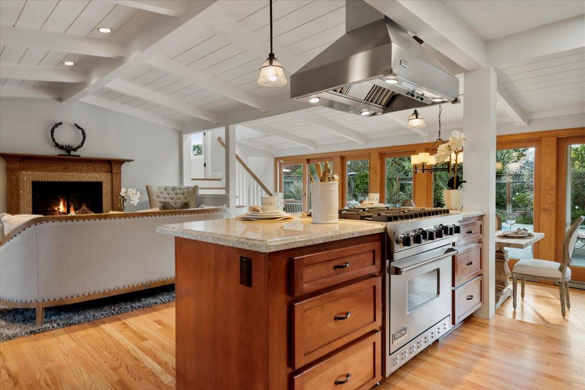 466 Springer Road Los Altos, CA 94024 - Photo 18 of 52 a kitchen with a stove and a fireplace