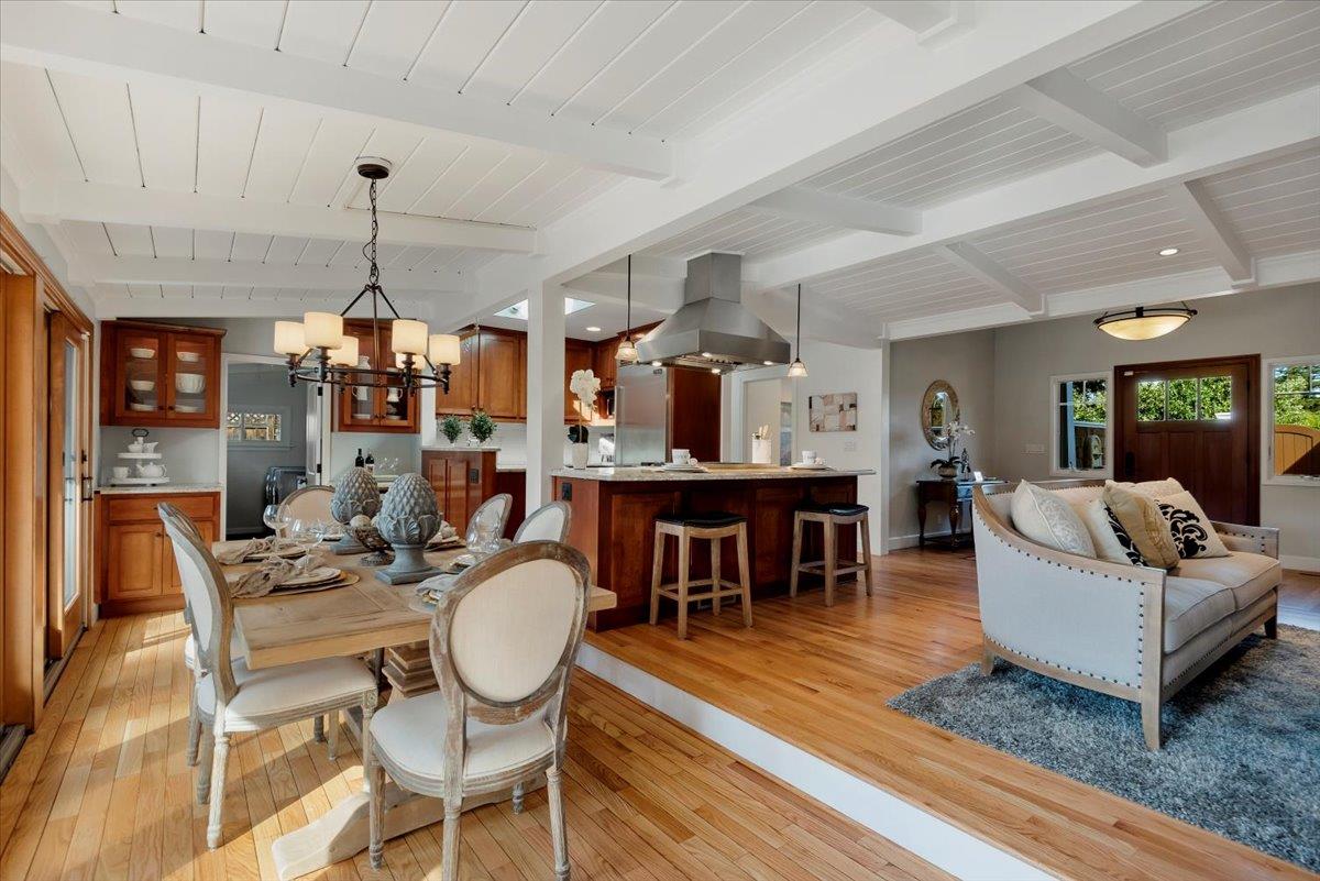 466 Springer Road Los Altos, CA 94024 - Photo 19 of 52 a living room with furniture kitchen view and a chandelier