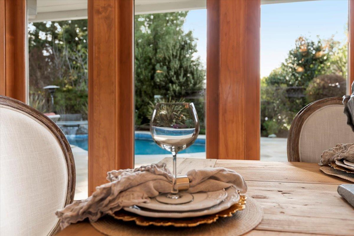 466 Springer Road Los Altos, CA 94024 - Photo 20 of 52 a swimming pool with a yard