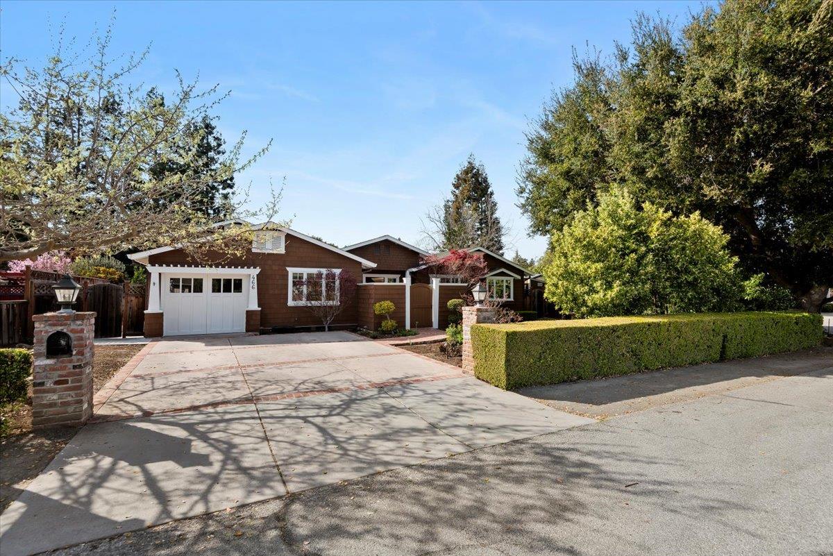 466 Springer Road Los Altos, CA 94024 - Photo 2 of 52 a front view of a house with a yard