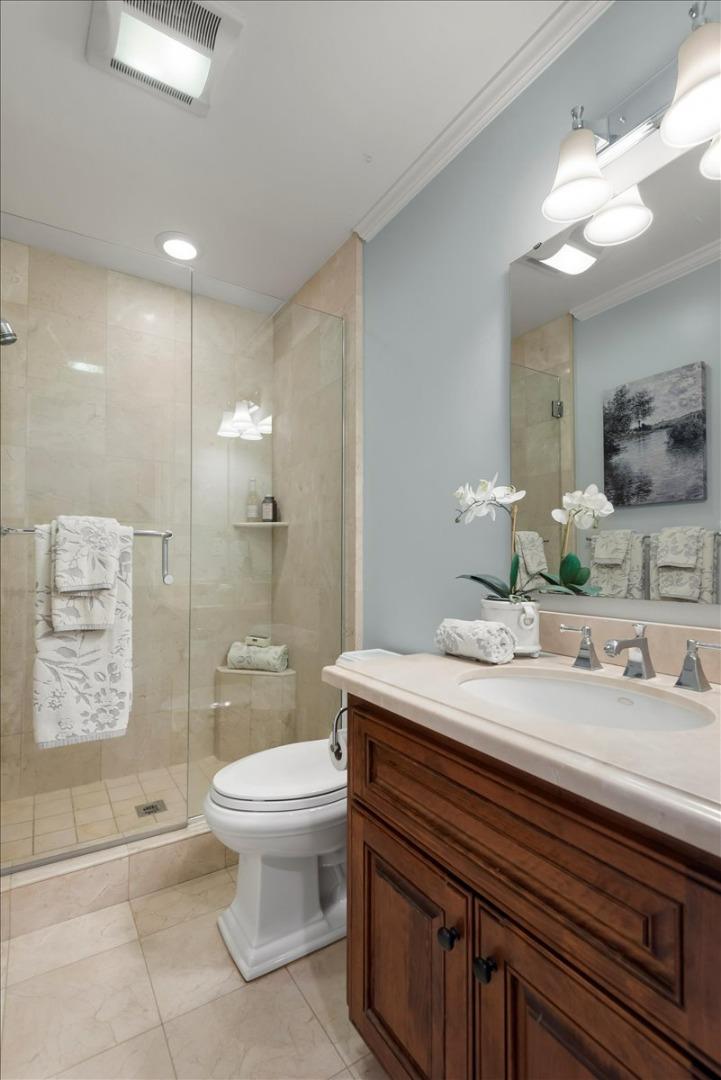 466 Springer Road Los Altos, CA 94024 - Photo 40 of 52 a bathroom with a sink a toilet and shower