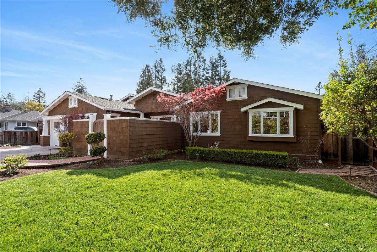 466 Springer Road Los Altos, CA 94024 - Photo 4 of 52 a front view of a house with a yard