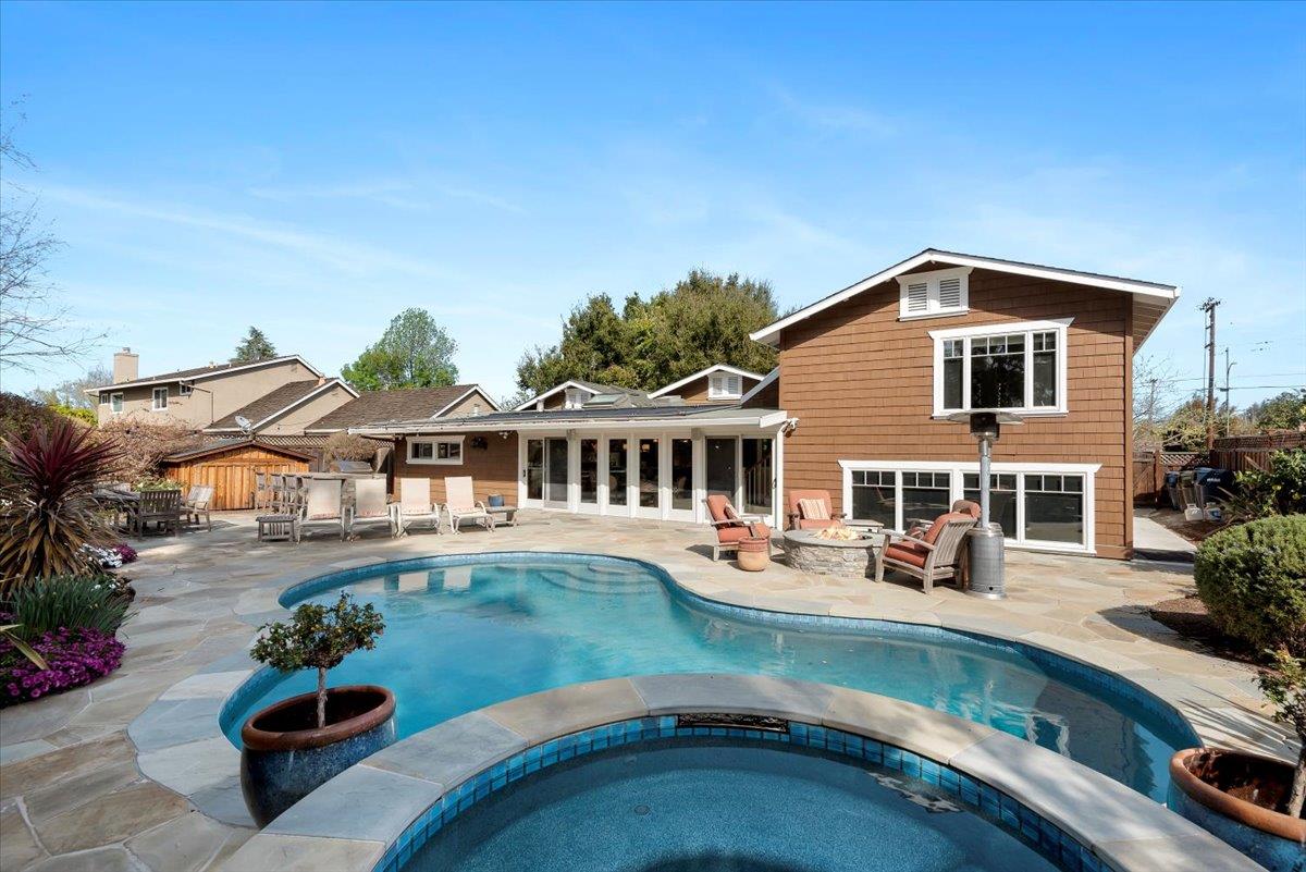 466 Springer Road Los Altos, CA 94024 - Photo 42 of 52 a front view of a house with garden