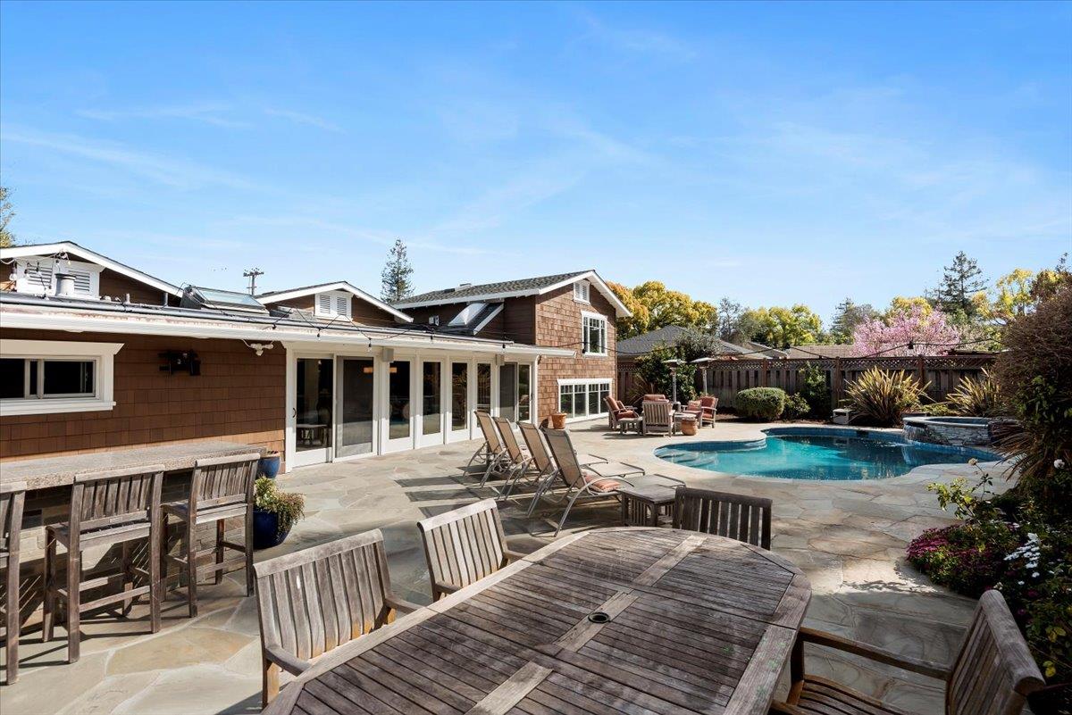 466 Springer Road Los Altos, CA 94024 - Photo 50 of 52 a view of a house with pool and chairs