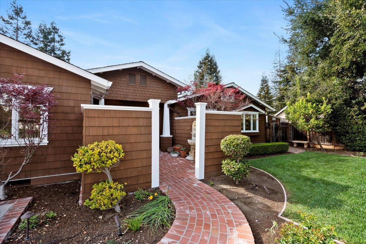 466 Springer Road Los Altos, CA 94024 - Photo 5 of 52 a front view of a house with a yard