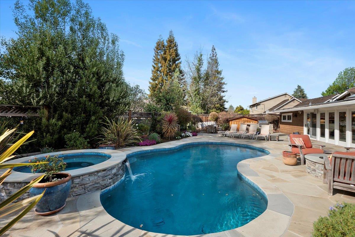 466 Springer Road Los Altos, CA 94024 - Photo 51 of 52 a view of a swimming pool with lounge chair