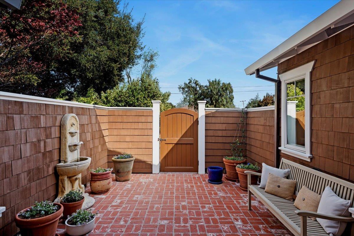 466 Springer Road Los Altos, CA 94024 - Photo 7 of 52 a view of a patio with a table and chairs
