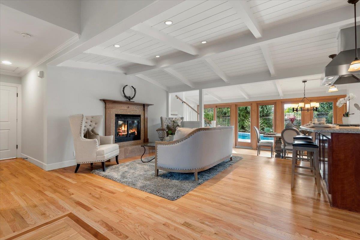 466 Springer Road Los Altos, CA 94024 - Photo 9 of 52 a living room with furniture and a fireplace
