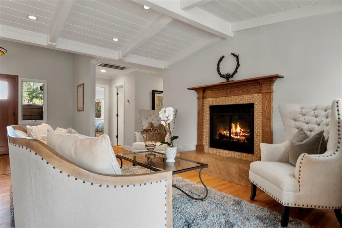 466 Springer Road Los Altos, CA 94024 - Photo 10 of 52 a living room with furniture a fireplace and a fireplace