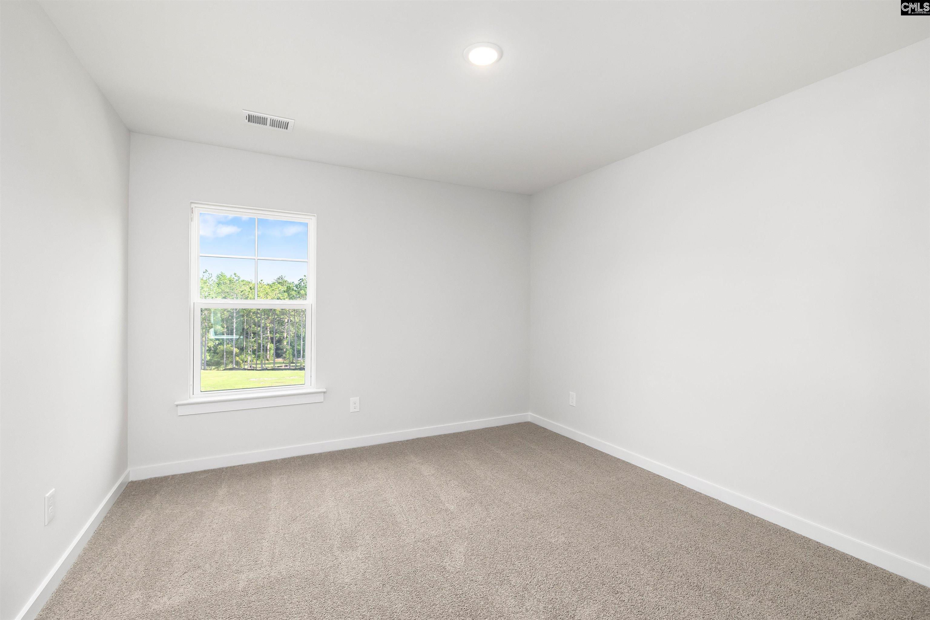 32 Fawn Spot Court Elgin, SC 29045 - Photo 23 of 28 an empty room with a window