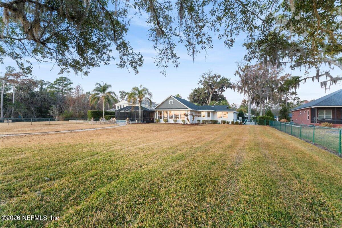 6215 West Shores Road Fleming Island, FL 32003 - Photo 56 of 103 a view of outdoor space with garden and trees