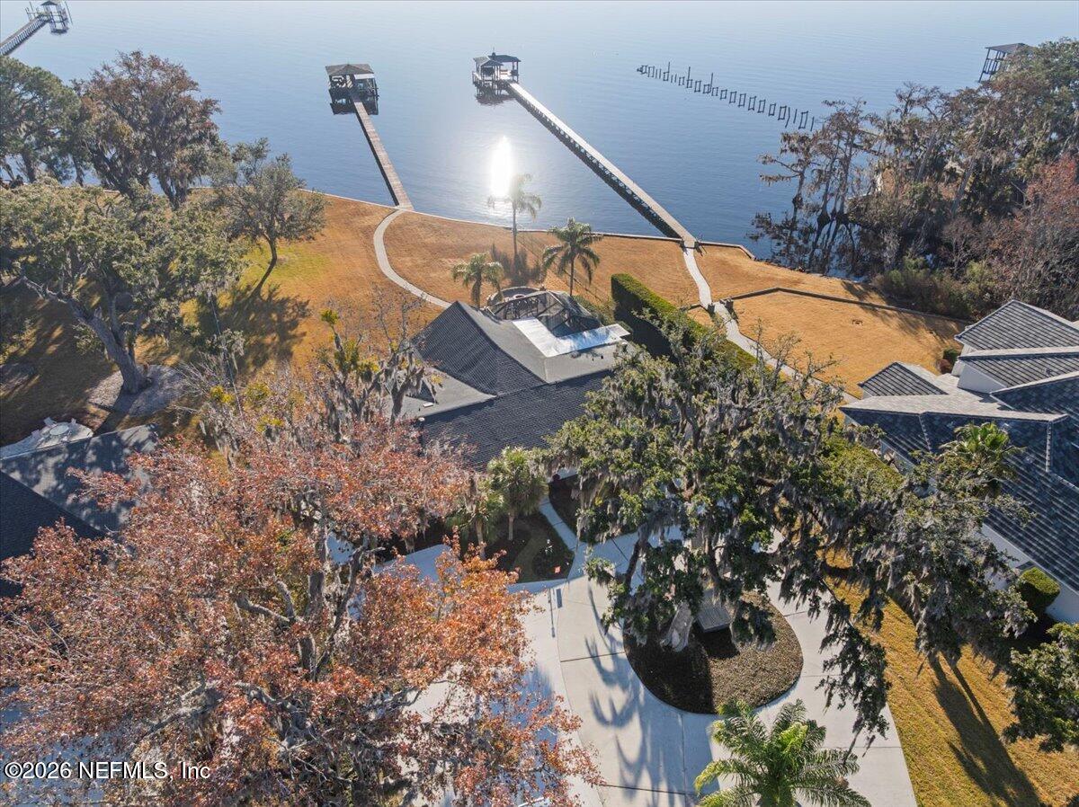 6215 West Shores Road Fleming Island, FL 32003 - Photo 92 of 103 an aerial view of a house with a yard and a large tree