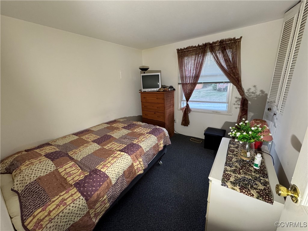 9332 Becar Road Chesterfield, VA 23236 - Photo 7 of 25 a bedroom with bed and window