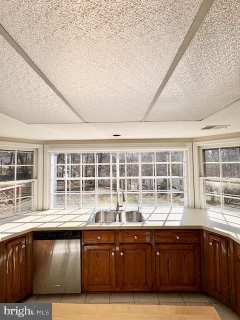 6825 Spring Beauty Court Springfield, VA 22152 - Photo 14 of 51 a open kitchen with granite countertop a sink window and cabinets