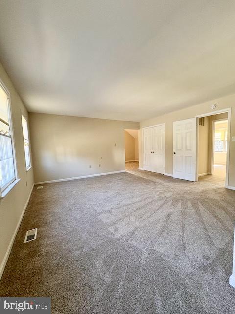6825 Spring Beauty Court Springfield, VA 22152 - Photo 29 of 51 an empty room with a empty space and windows
