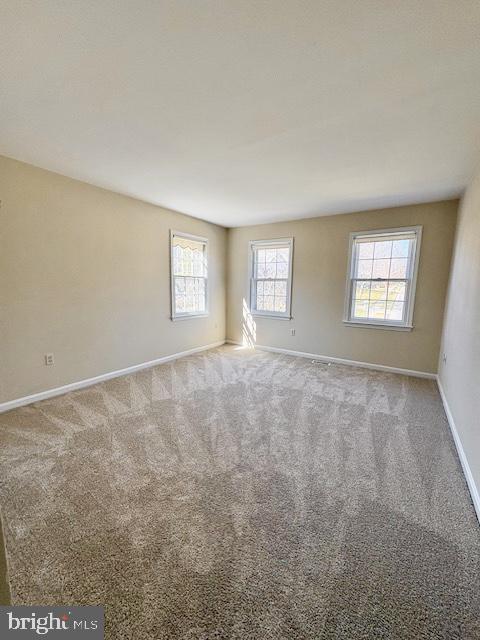 6825 Spring Beauty Court Springfield, VA 22152 - Photo 39 of 51 a view of an empty room with windows