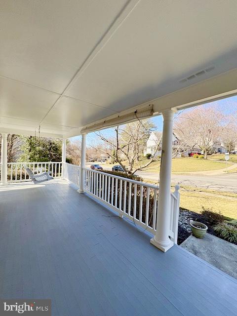6825 Spring Beauty Court Springfield, VA 22152 - Photo 5 of 51 a view of hallway with three large trees and ocean view