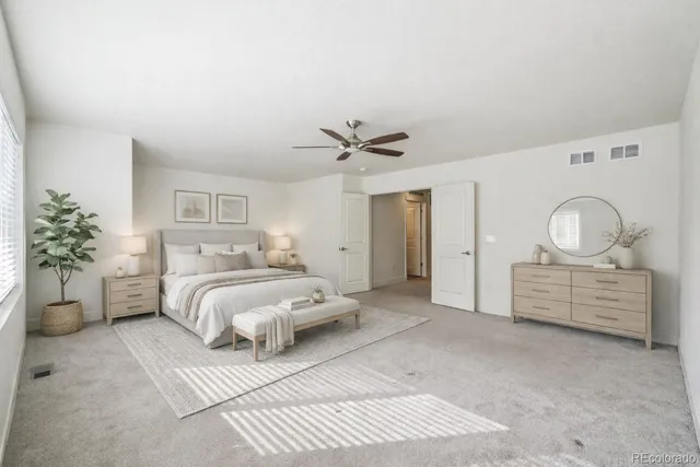 a kitchen with kitchen island granite countertop a sink stove and refrigerator